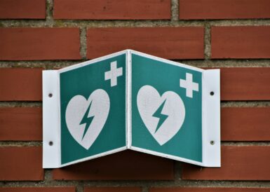 green and white arrow sign
